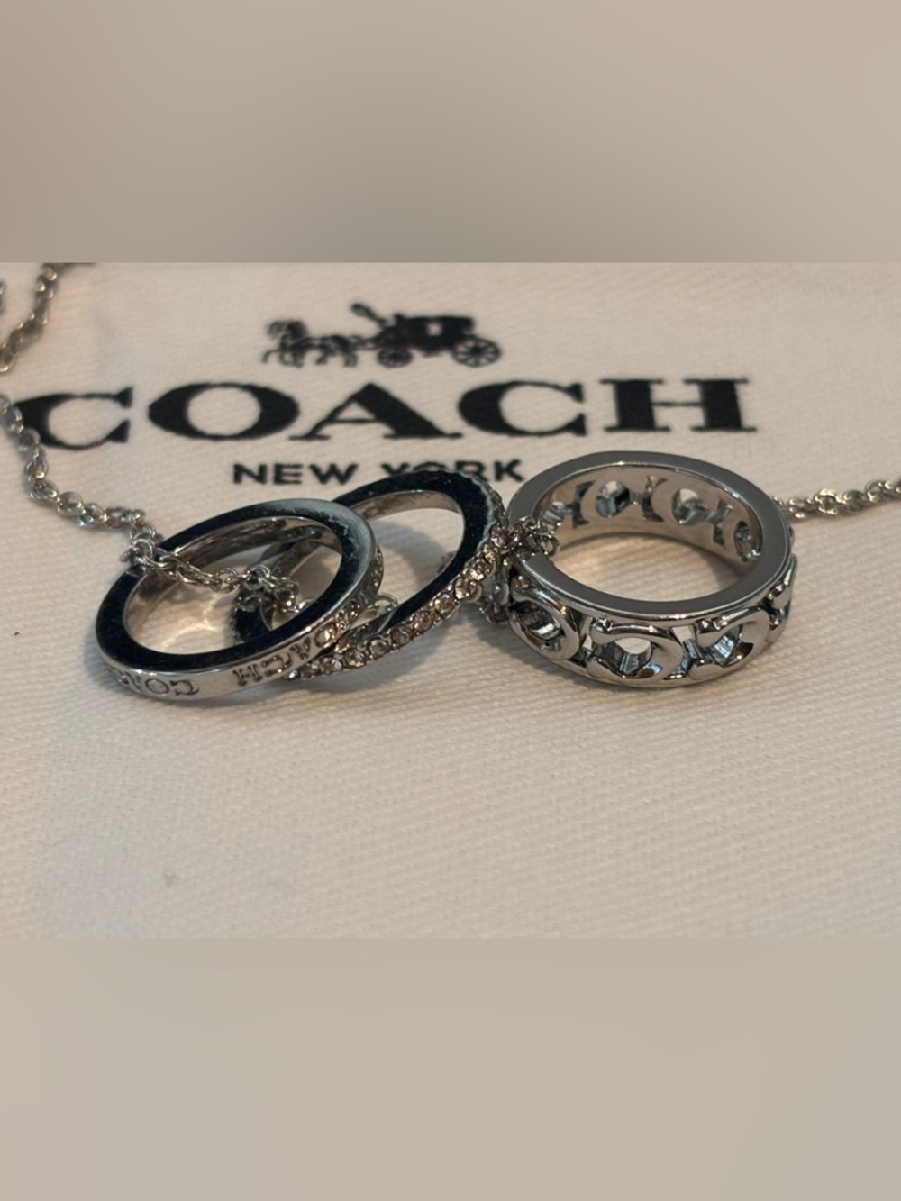 ✨ Coach Triple Ring Pendant Necklace Silver Tone NWT ✨ - Picture 2 of 16
